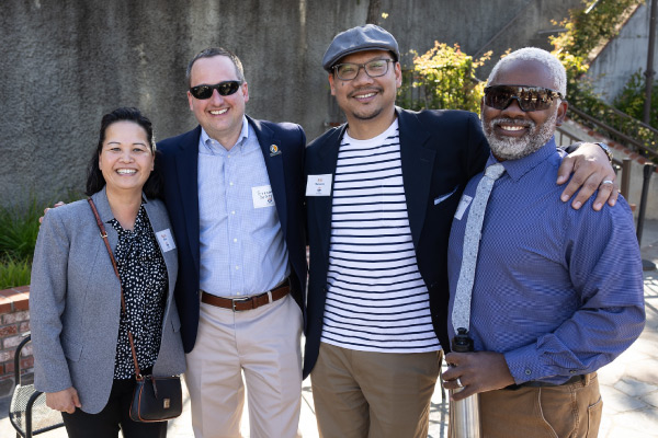 Four administrators at end-of-year celebration event