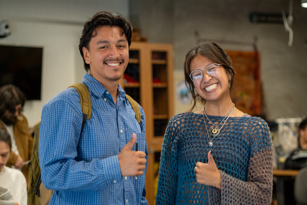 Two Architecture Club students giving thumbs up